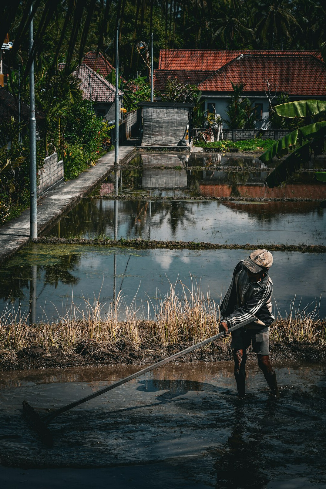 Photographer documenting a village scene